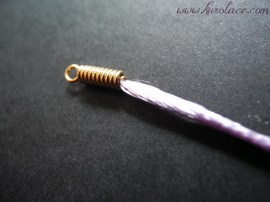 See where the coil wire end has been clamped down?